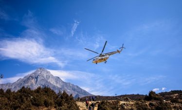 Helicopter flying over Everest Base Camp with views of Kala Patthar and Gokyo Lakes.