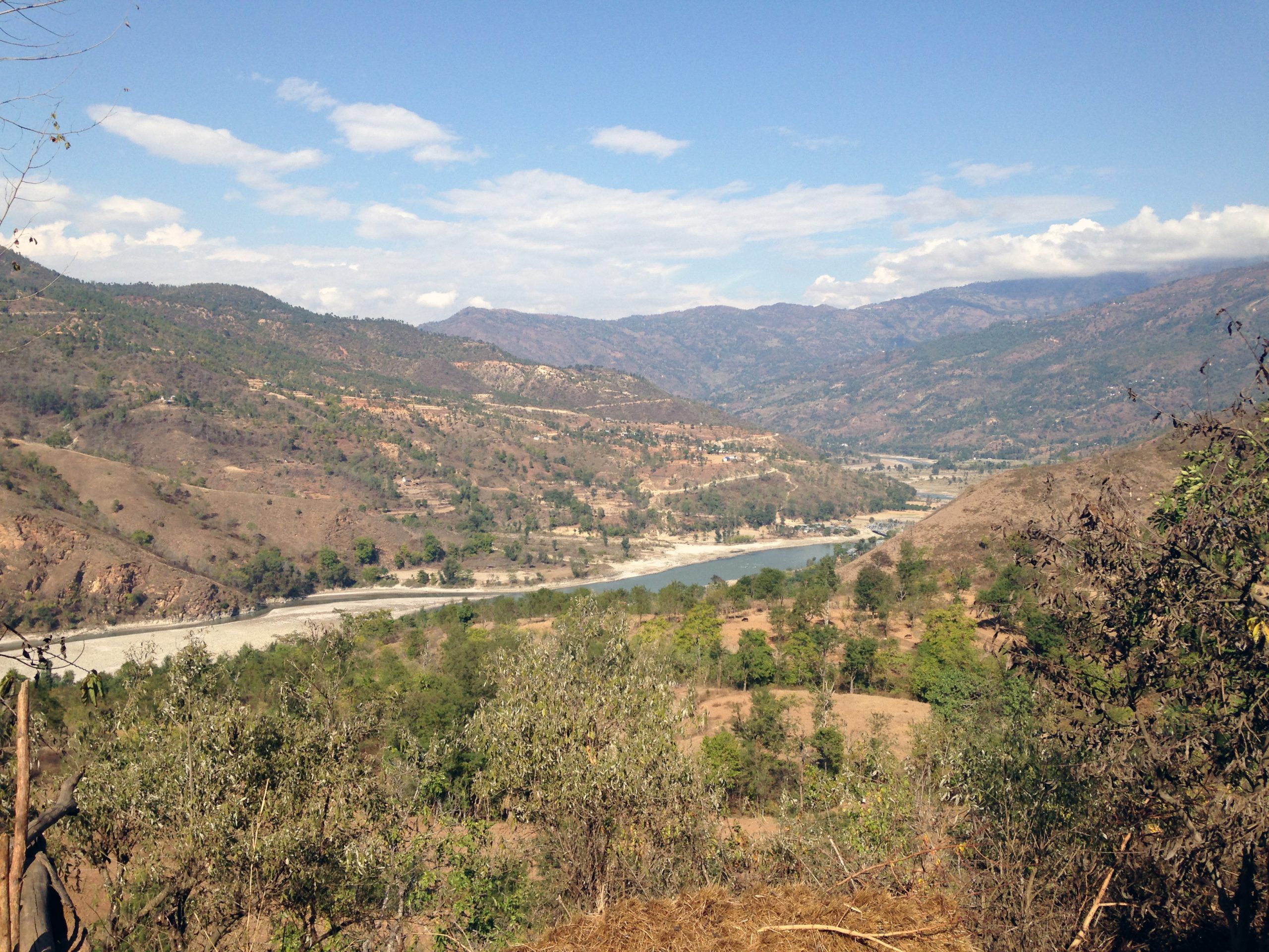 Arun Valley with snow-capped Himalayan peaks in the background during the trek