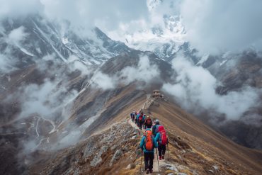 Himalayan trekking in Nepal showing a guide leading trekkers safely along snowy mountain trails, highlighting trekking safety and solo vs agency trekking.