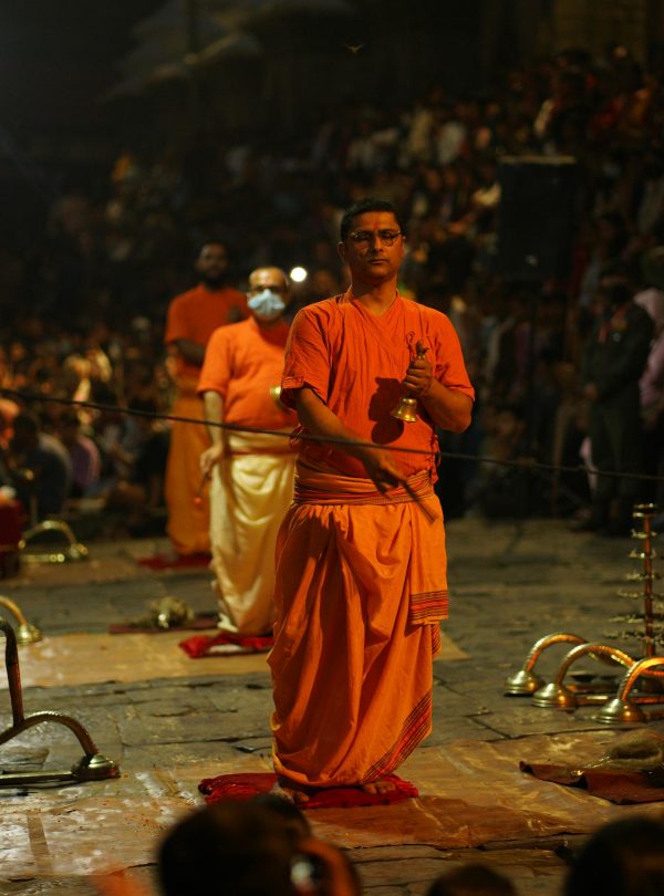 Hindu ritual with priests performing evening Aarati at Pashupatinath Temple in Kathmandu, Nepal.