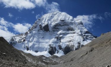 Kailash Manasarovar Yatra via Kerung with pilgrims trekking through high-altitude Tibetan landscapes, mountains, and Manasarovar Lake.