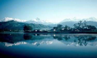 Sunrise view of Annapurna range from Sarangkot, Pokhara with clear sky and scenic Himalayan peaks