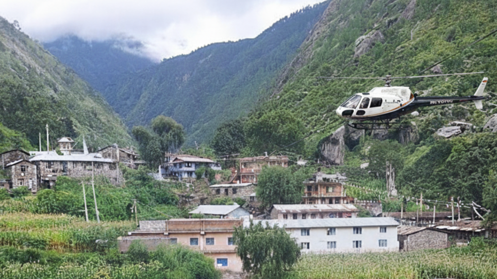 helicopter flying over Langtang Himalayan peaks with snow-capped mountains, green valleys, and a river below.