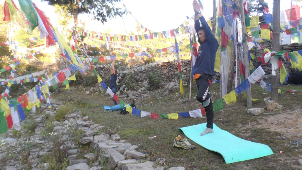 Everest Base Camp Yoga Trek 2026 with Himalayan mountains and yoga practice in Nepal