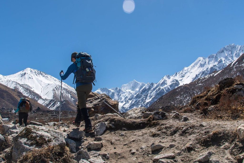 Gosaikunda Trek Guide 2026 showing trekkers hiking toward the sacred Gosaikunda Lake in Langtang National Park, Nepal.
