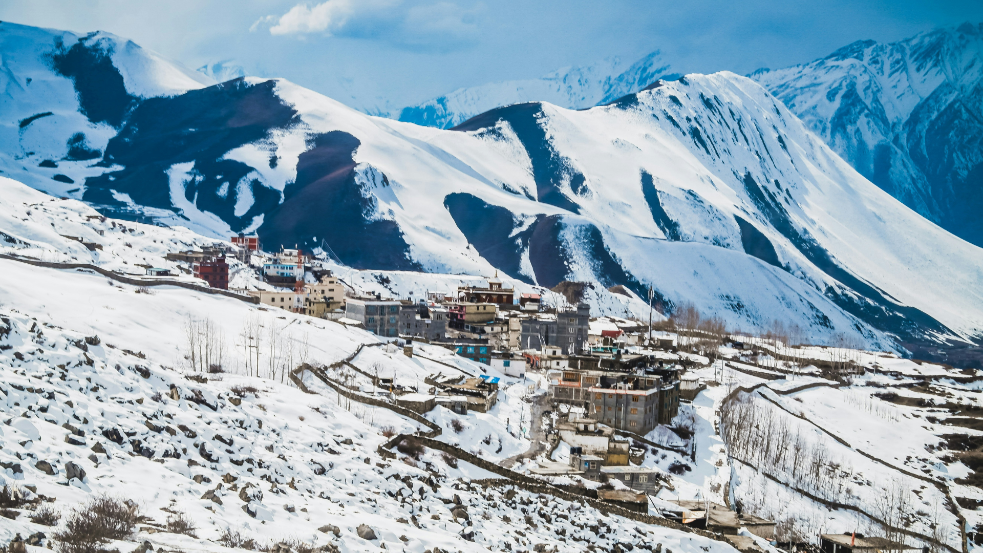Muktinath Trek Guide 2026: Route, Cost & Best Time with Himalayan mountains and colorful prayer flags in Mustang Nepal during the Muktinath trekking journey.