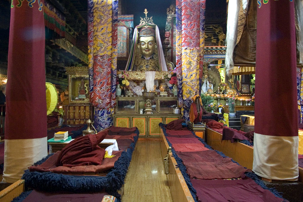 Sacred Charm of Jokhang Temple 2026 with golden rooftop, Tibetan architecture, and colorful prayer flags in Lhasa